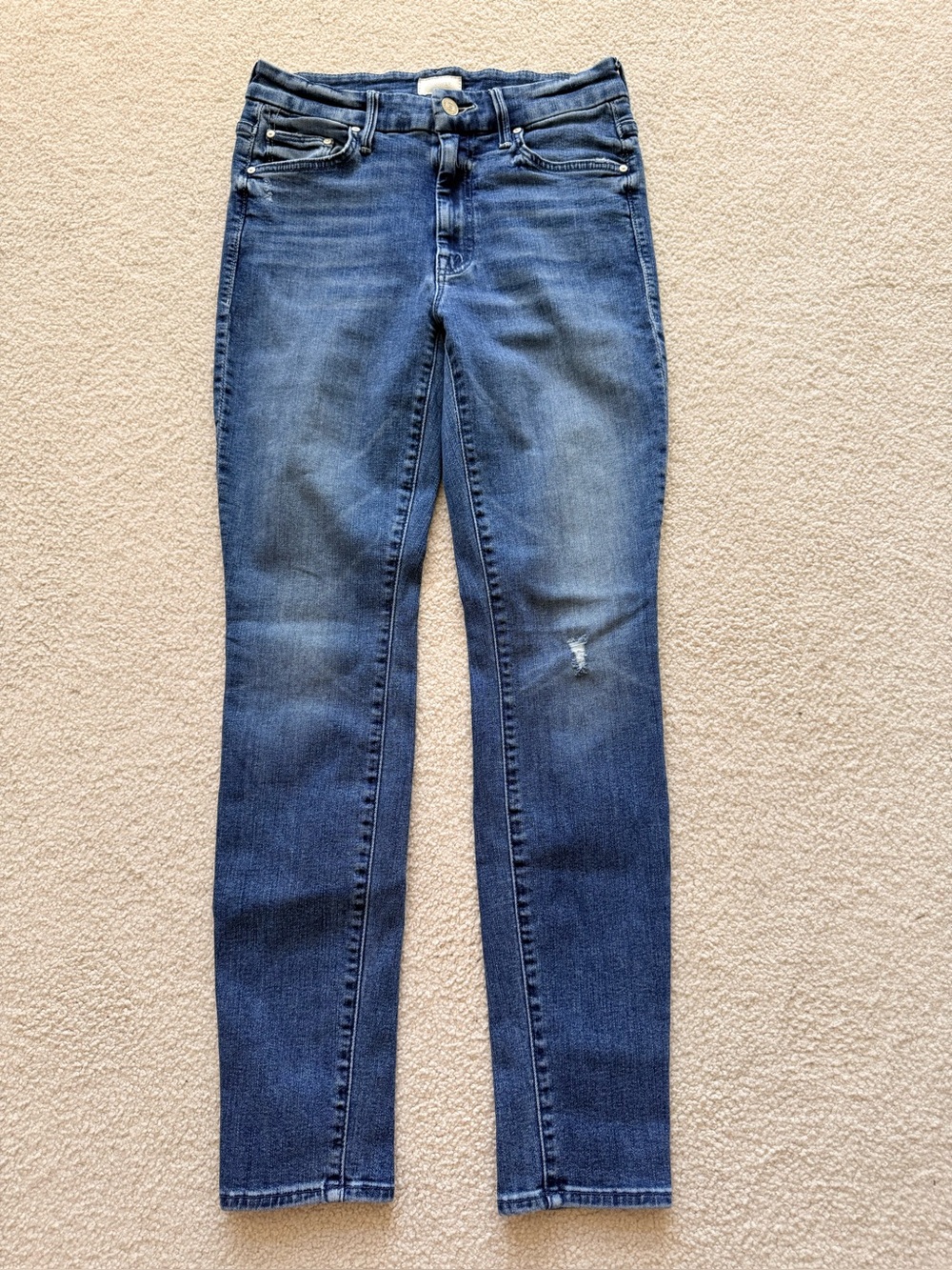 Mother “The Looker” high-waisted skinny jeans in a faded medium wash